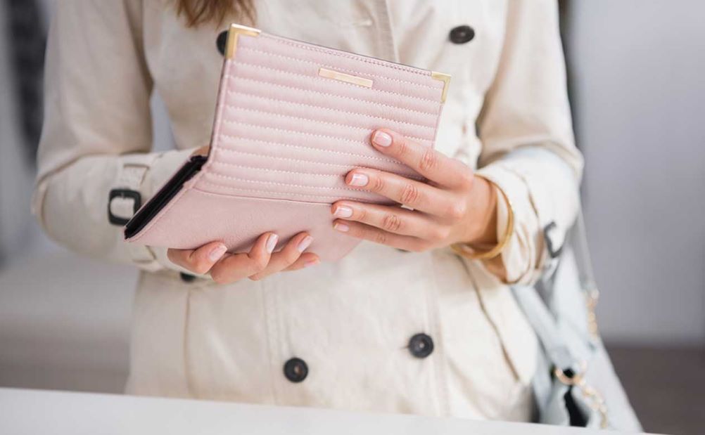 Woman Opening Wallet