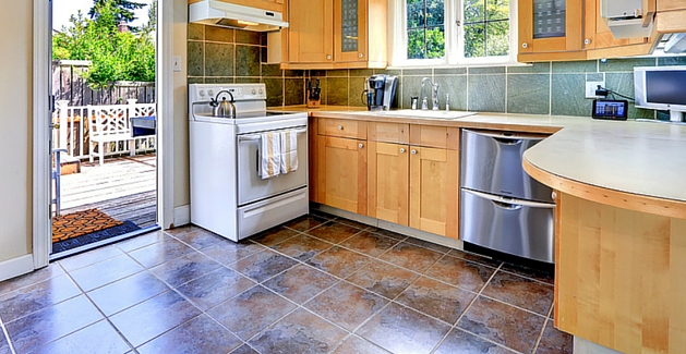 casual kitchen with brown and gray tile
