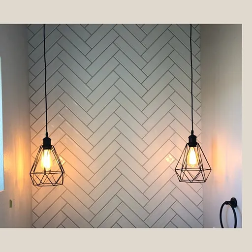 Bathroom backsplash tile with hanging light fixtures in Greeley 